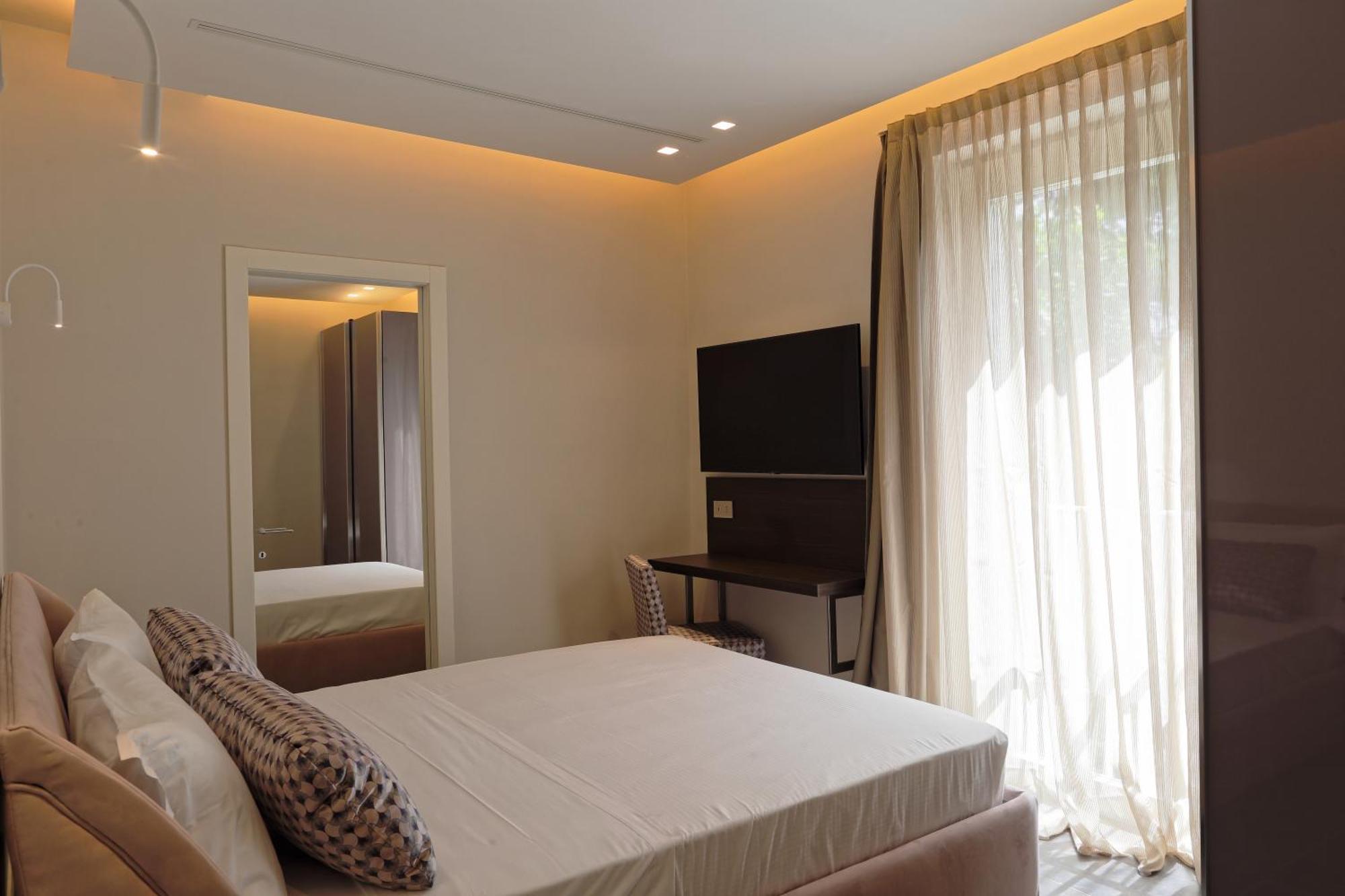 Elegance Riccione Lejlighedshotel Værelse billede
